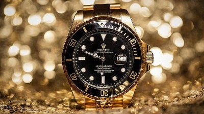 HD wallpaper gold diamond rolex watch in lights bokeh background rolex Die Faszination von Replica Patek Philippe Uhren